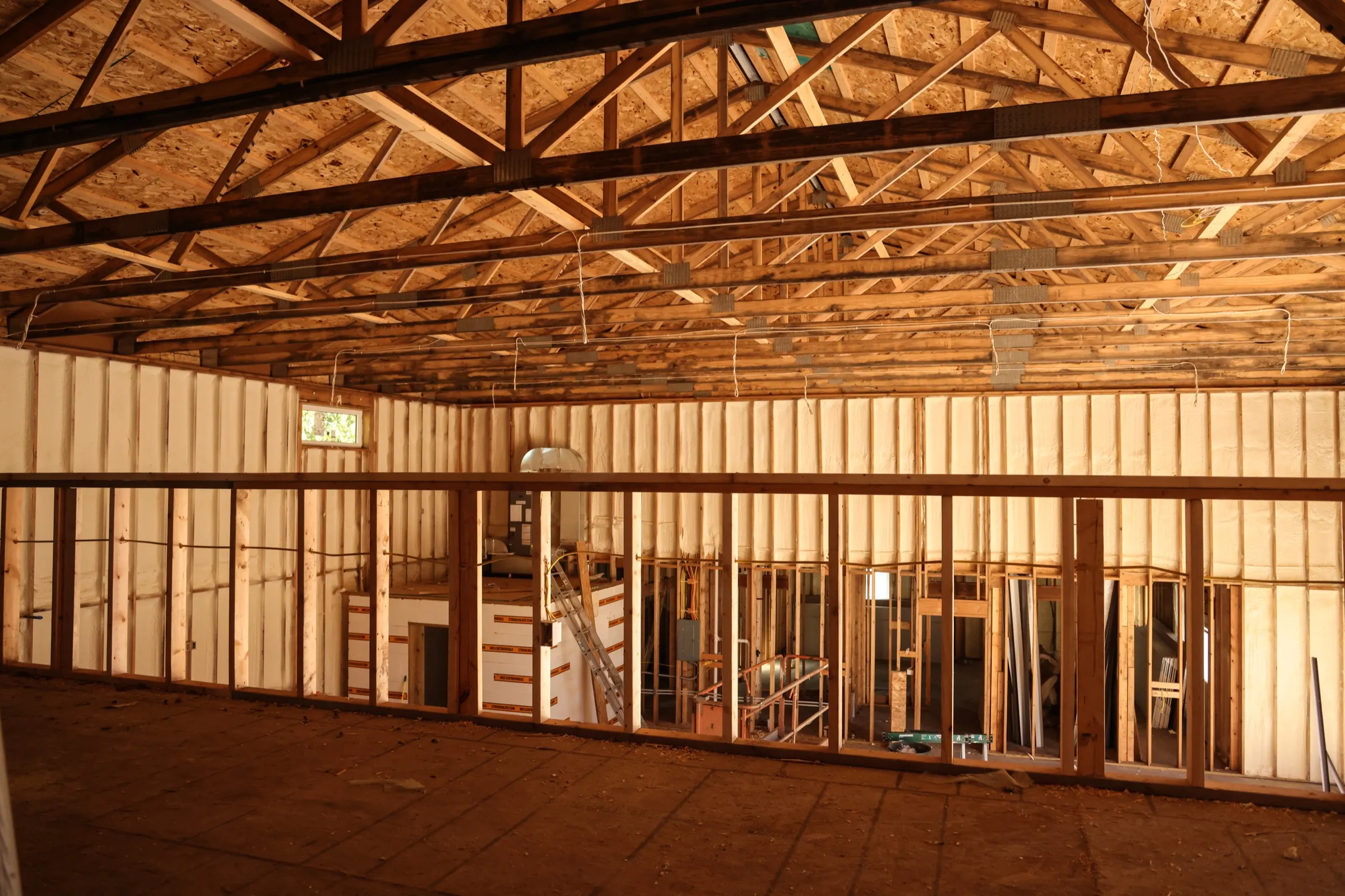 Attic insulated with spray foam between rafters